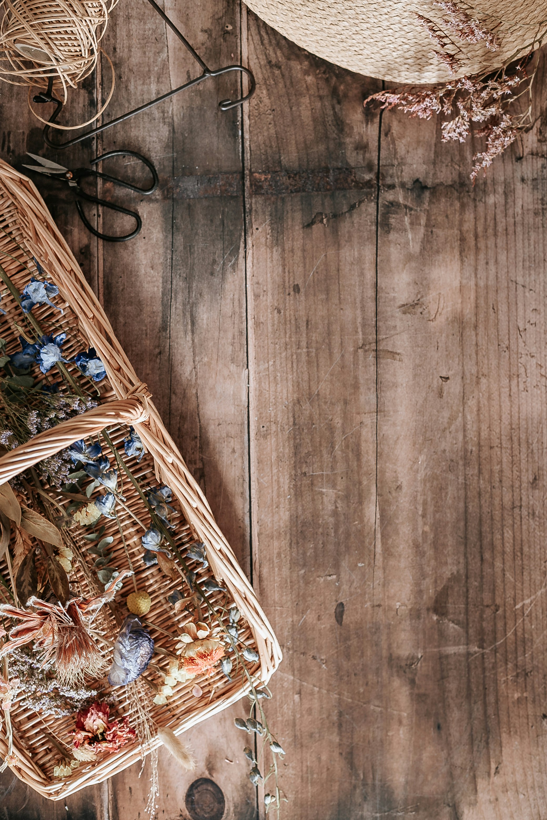 brown woven basket on brown wooden floor